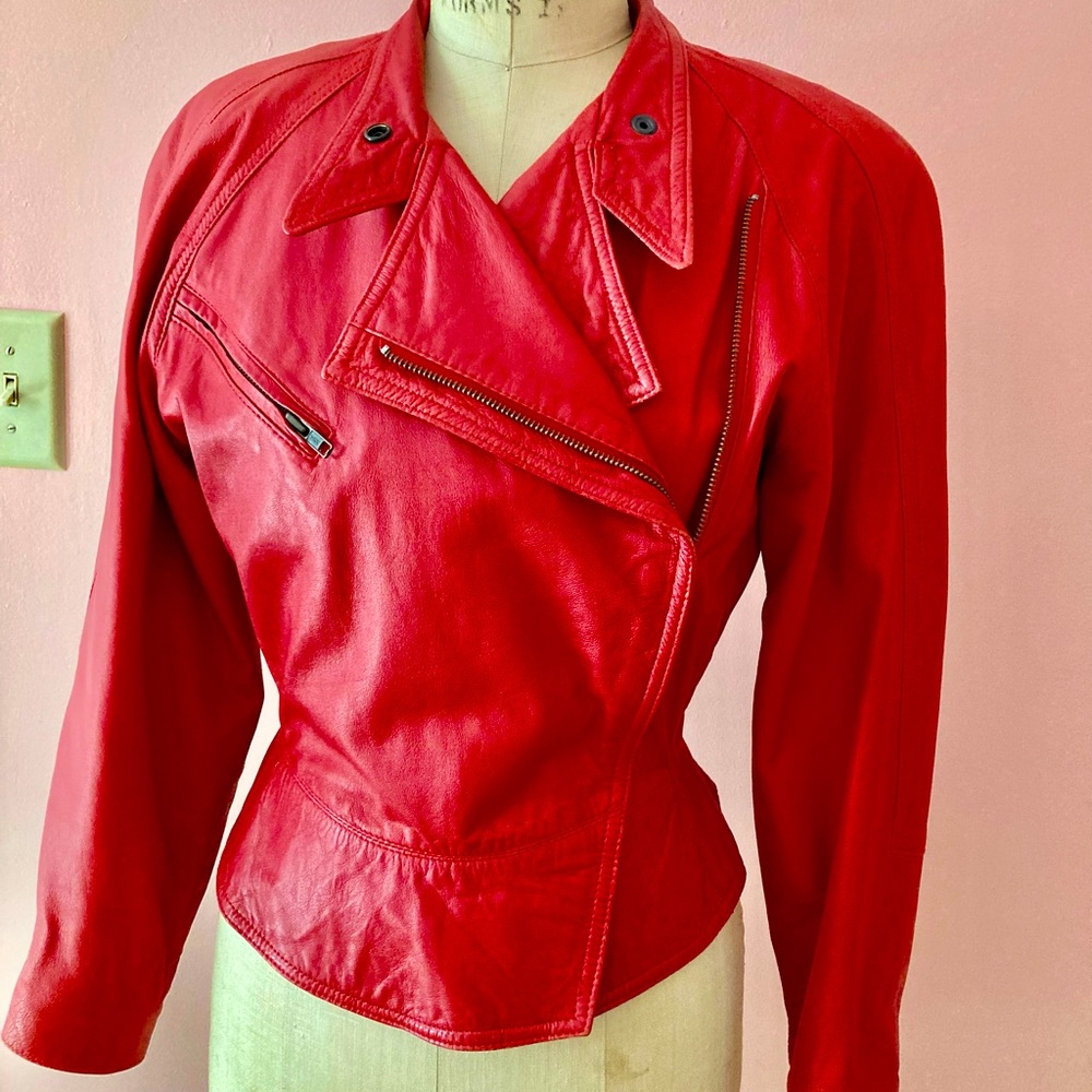 Beautiful cherry red, short leather jacket. 80s vibe. Size small, zipper front.